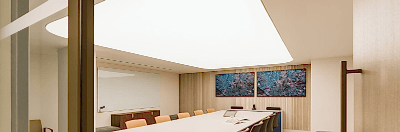 Bright meeting room with illuminated fabric ceilings