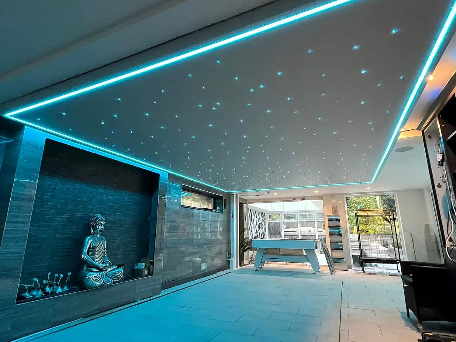 Room with illuminated stretch ceiling